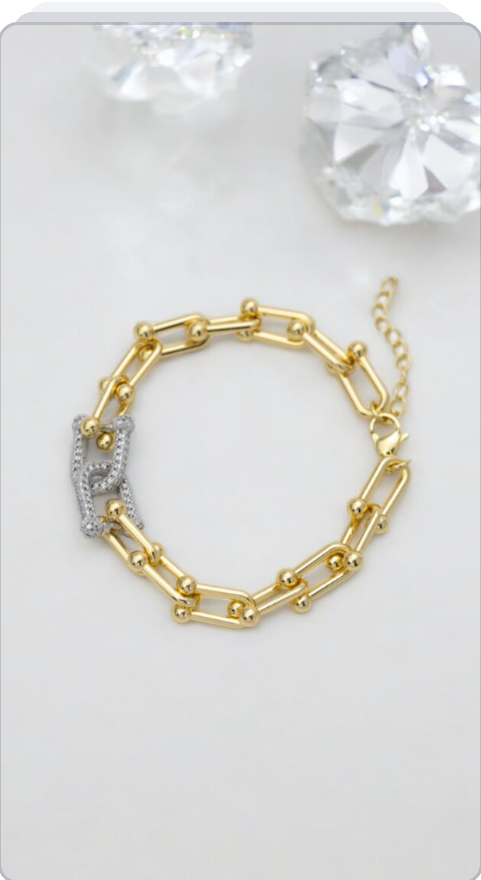 Gold bracelet with silver details