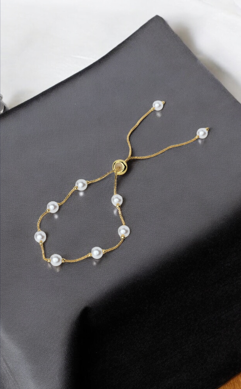 Gold Bracelet with White Pearls