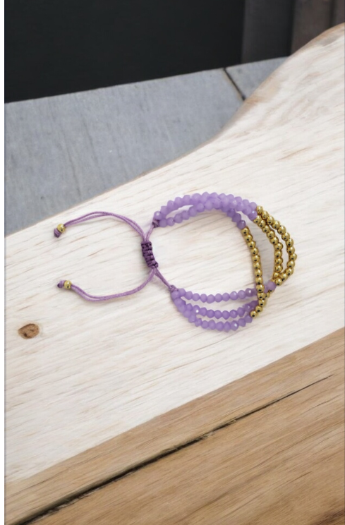 Adjustable bracelet in purple and gold color